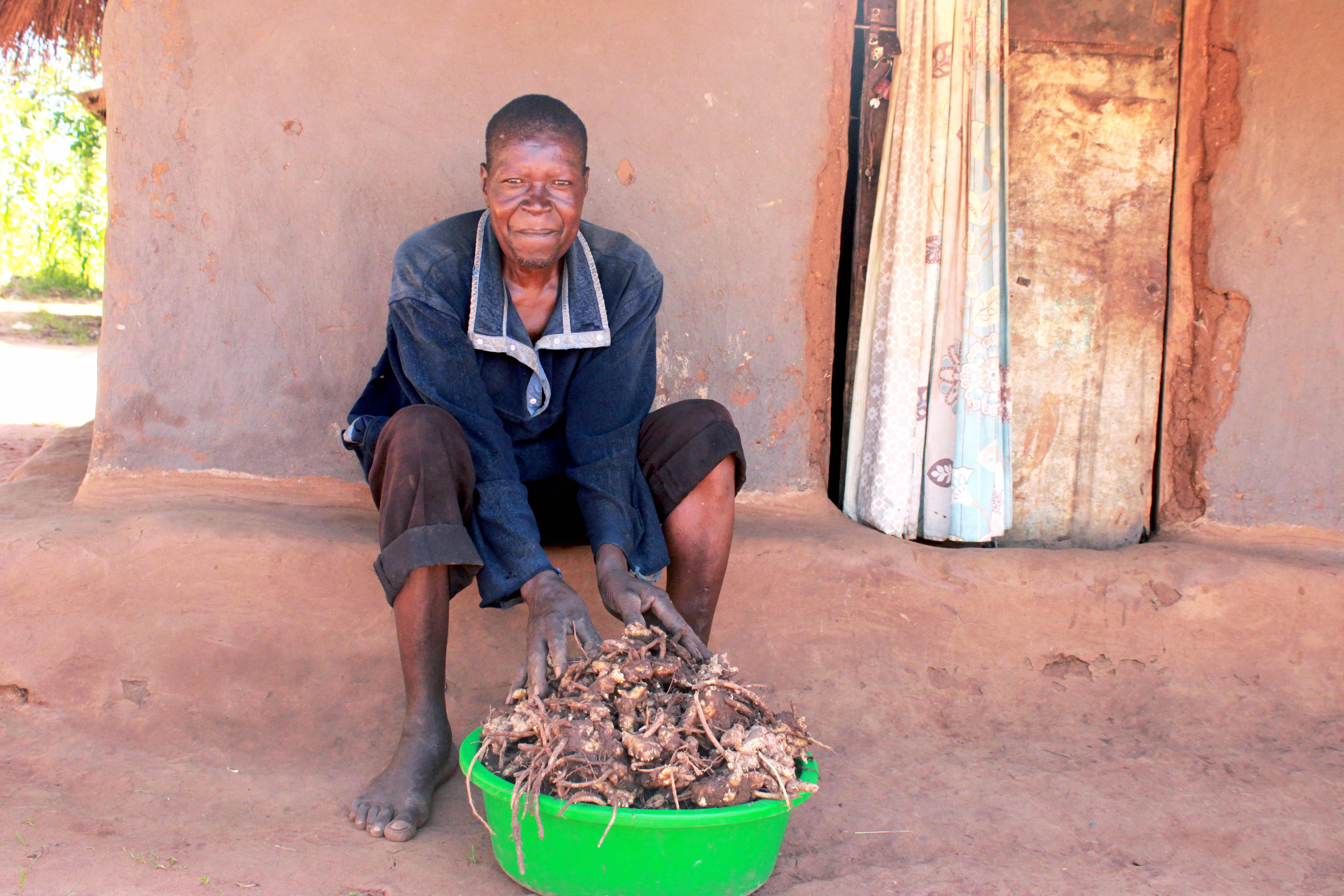 Francis proudly displaying his ginger harvest from his Forest Garden in late November.